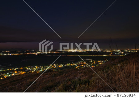 view from the mountain to the lights of the city 97156934