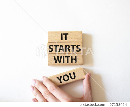 It starts with you symbol. Wooden blocks with words It starts with you. Beautiful white background. Businessman hand. Business and It starts with you concept. Copy space. It starts with you symbol. Wooden blocks with words It starts with you. Beautiful white background. Businessman hand. Business and It starts with you concept. Copy space. 97158434