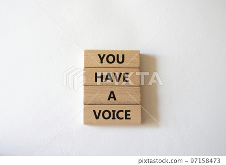 You have a voice symbol. Concept words You have a voice on wooden blocks. Beautiful white background. Business and You have a voice concept. Copy space. 97158473