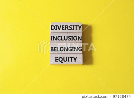Diversity Inclusion Belonging Equity symbol. Concept words Diversity Inclusion Belonging Equity on wooden blocks. Beautiful yellow background. Business concept. Copy space. Diversity Inclusion Belonging Equity symbol. Concept words Diversity Inclusion Belonging Equity on wooden blocks. Beautiful yellow background. Business concept. Copy space. 97158474
