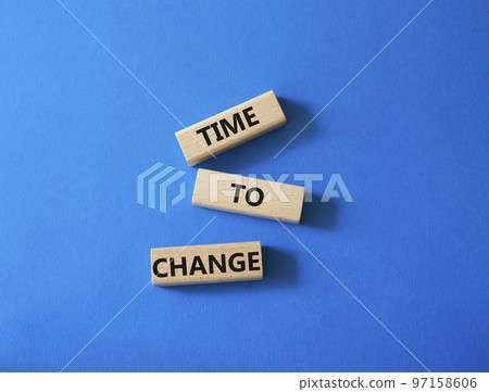Time to change symbol. Concept word Time to change on wooden blocks. Beautiful blue background. Business and Time to change concept. Copy space Time to change symbol. Concept word Time to change on wooden blocks. Beautiful blue background. Business and Time to change concept. Copy space 97158606
