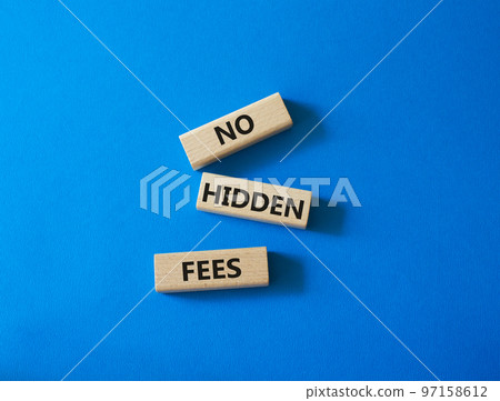 No hidden fees symbol. Concept word No hidden fees on wooden blocks. Beautiful blue background. Business and No hidden fees concept. Copy space 97158612