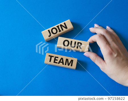Join our team symbol. Wooden blocks with words Join our team. Beautiful blue background. Businessman hand. Business and Join our team concept. Copy space. 97158622