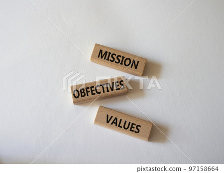 Mission Objectives Values symbol. Concept words Mission Objectives Values on wooden blocks. Beautiful white background. Business and Mission Objectives Values concept. Copy space 97158664