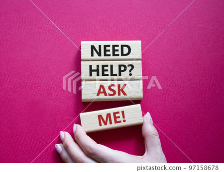 Need help ask me symbol. Concept words Need help ask me on wooden blocks. Beautiful red background. Businessman hand. Business and Need help ask me concept. Copy space 97158678