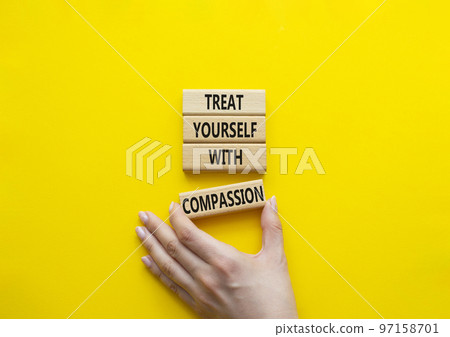 Treat yourself with compassion symbol. Concept words Treat yourself with compassion on wooden blocks. Beautiful yellow background. Doctor hand. Medicine concept. Copy space. Treat yourself with compassion symbol. Concept words Treat yourself with compassion on wooden blocks. Beautiful yellow background. Doctor hand. Medicine concept. Copy space. 97158701