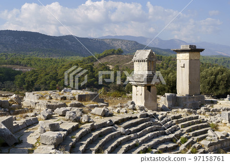 Ancient city of Xanthos in turkey. Stone columns with decoration and decor. Ruins of ancient Greek civilization, stone objects of culture and art. 97158761