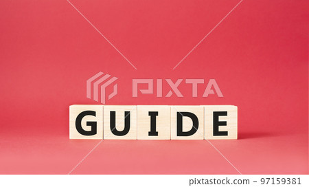 Guide symbol. Wooden cubes with word Guide. Beautiful red background. Guide concept. Copy space. Guide symbol. Wooden cubes with word Guide. Beautiful red background. Guide concept. Copy space. 97159381