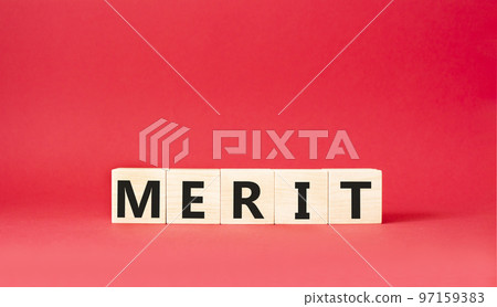 Merit symbol. Concept word Merit on wooden cubes. Beautiful red background. Business and Merit concept. Copy space. Merit symbol. Concept word Merit on wooden cubes. Beautiful red background. Business and Merit concept. Copy space. 97159383