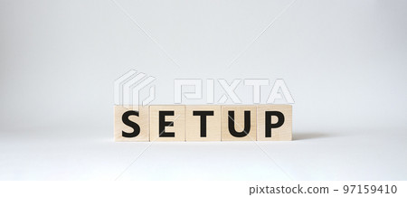 Setup symbol. Wooden cubes with word Setup. Beautiful white background. Setup concept. Copy space. Setup symbol. Wooden cubes with word Setup. Beautiful white background. Setup concept. Copy space. 97159410