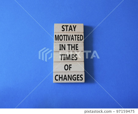 Motivation and changes symbol. Concept words Stay motivated in the times of changes on wooden blocks. Beautiful blue background. Business concept. Copy space. Motivation and changes symbol. Concept words Stay motivated in the times of changes on wooden blocks. Beautiful blue background. Business concept. Copy space. 97159475