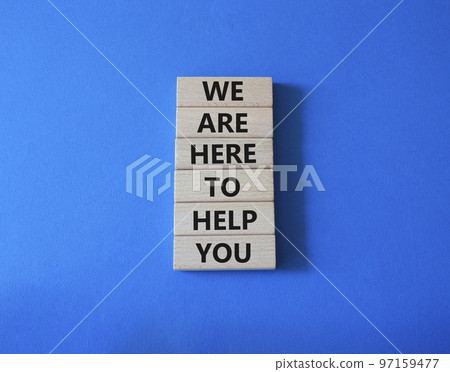 We are here to help you symbol. Concept words we are here to help you on wooden blocks. Beautiful blue background. Business and we are here to help you concept. Copy space. We are here to help you symbol. Concept words we are here to help you on wooden blocks. Beautiful blue background. Business and we are here to help you concept. Copy space. 97159477