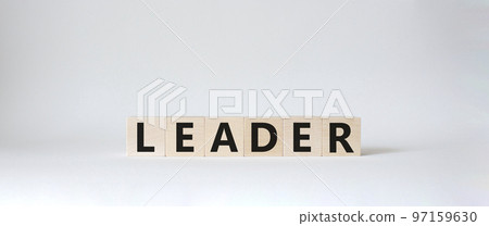 Leader symbol. Concept word Leader on wooden cubes. Beautiful white background. Business and Leader concept. Copy space. 97159630