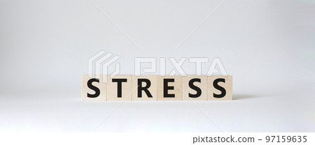 Stress symbol. Concept word Stress on wooden cubes. Beautiful white background. Medicine and Stress concept. Copy space. Stress symbol. Concept word Stress on wooden cubes. Beautiful white background. Medicine and Stress concept. Copy space. 97159635