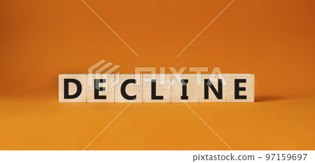 Decline symbol. Concept word Decline on wooden cubes. Beautiful orange background. Business and Decline concept. Copy space. Decline symbol. Concept word Decline on wooden cubes. Beautiful orange background. Business and Decline concept. Copy space. 97159697