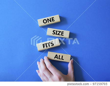 One size fits all symbol. Concept words One size fits all on wooden blocks. Beautiful blue background. Businessman hand. Business and One size fits all concept. Copy space. One size fits all symbol. Concept words One size fits all on wooden blocks. Beautiful blue background. Businessman hand. Business and One size fits all concept. Copy space. 97159703