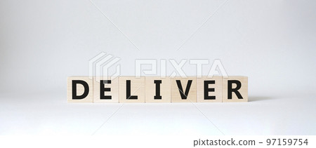 Deliver symbol. Concept word Deliver on wooden cubes. Beautiful white background. Business and Deliver concept. Copy space. 97159754