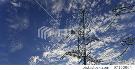 Electricity pylon (high voltage power line) on the background of the cloudy sky Electricity pylon (high voltage power line) on the background of the cloudy sky 97160964