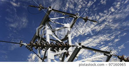 Electricity pylon (high voltage power line) on the background of the cloudy sky Electricity pylon (high voltage power line) on the background of the cloudy sky 97160965