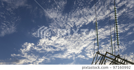 Electricity pylon (high voltage power line) on the background of the cloudy sky Electricity pylon (high voltage power line) on the background of the cloudy sky 97160992
