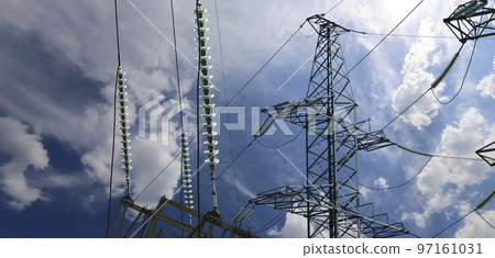 Electricity pylon (high voltage power line) on the background of the cloudy sky 97161031