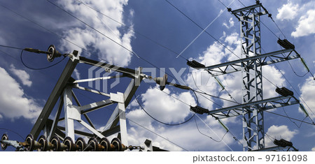 Electricity pylon (high voltage power line) on the background of the cloudy sky 97161098