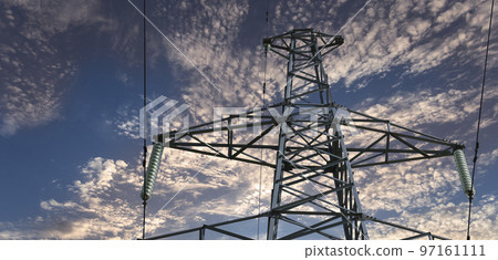 Electricity pylon (high voltage power line) against the background of a romantic evening sky Electricity pylon (high voltage power line) against the background of a romantic evening sky 97161111