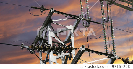Electricity pylon (high voltage power line) against the background of a romantic evening sky Electricity pylon (high voltage power line) against the background of a romantic evening sky 97161208