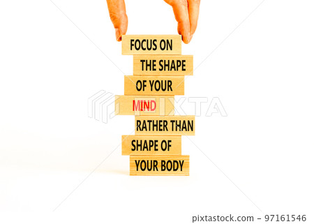 Mind or body symbol. Concept words Focus on the shape of mind rather than shape of your body on wooden blocks. Beautiful white background copy space. Businessman hand. Business mind or body concept. Mind or body symbol. Concept words Focus on the shape of mind rather than shape of your body on wooden blocks. Beautiful white background copy space. Businessman hand. Business mind or body concept. 97161546