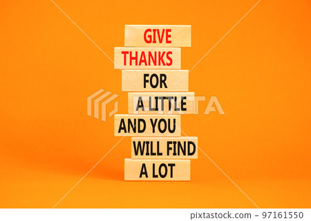 Give thanks symbol. Concept words Give thanks for a little and you will find a lot on wooden blocks. Beautiful orange background copy space. Business motivational give thanks concept Give thanks symbol. Concept words Give thanks for a little and you will find a lot on wooden blocks. Beautiful orange background copy space. Business motivational give thanks concept 97161550