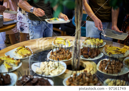 people at a banquet 97161749