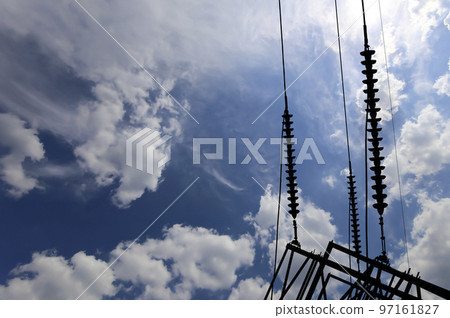 Electricity pylon (high voltage power line), black contour, on the background of the cloudy sky Electricity pylon (high voltage power line), black contour, on the background of the cloudy sky 97161827