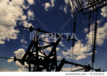Electricity pylon (high voltage power line), black contour, against the background of a romantic evening sky Electricity pylon (high voltage power line), black contour, against the background of a romantic evening sky 97161845
