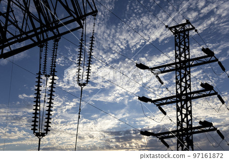 Electricity pylon (high voltage power line), black contour, on the background of the cloudy sky Electricity pylon (high voltage power line), black contour, on the background of the cloudy sky 97161872