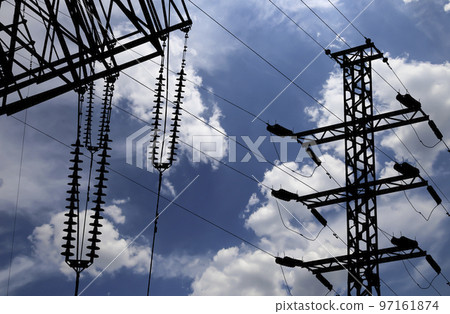 Electricity pylon (high voltage power line), black contour, on the background of the cloudy sky Electricity pylon (high voltage power line), black contour, on the background of the cloudy sky 97161874