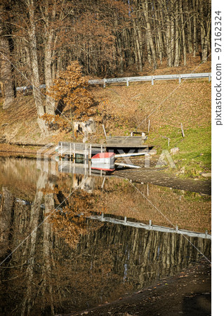 Water reservoir Pocuvadlo in Stiavnica Mountains, Slovakia, seasonal natural scene Water reservoir Pocuvadlo in Stiavnica Mountains, Slovakia, seasonal natural scene 97162324