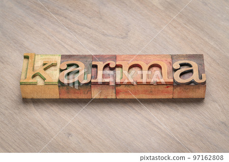 karma word in wood type 97162808