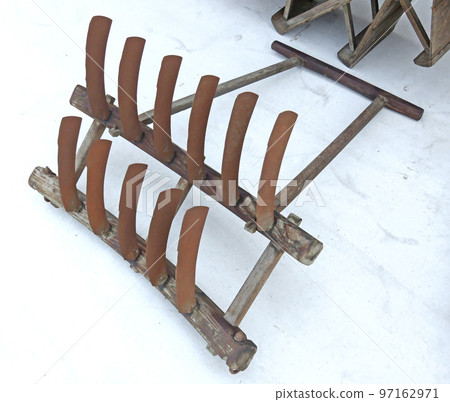 Old-fashioned farm equipment hoe 97162971