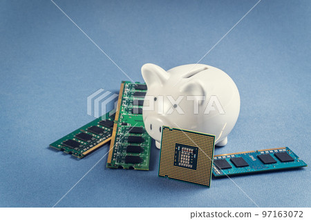 Piggy bank and computer chips, RAM, processor 97163072