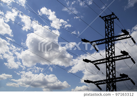 Electricity pylon (high voltage power line), black contour, on the background of the cloudy sky Electricity pylon (high voltage power line), black contour, on the background of the cloudy sky 97163312