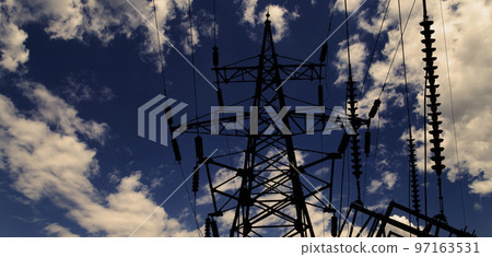 Electricity pylon (high voltage power line), black contour,  against the background of a romantic evening sky 97163531