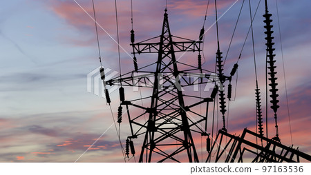 Electricity pylon (high voltage power line), black contour,  against the background of a romantic evening sky 97163536