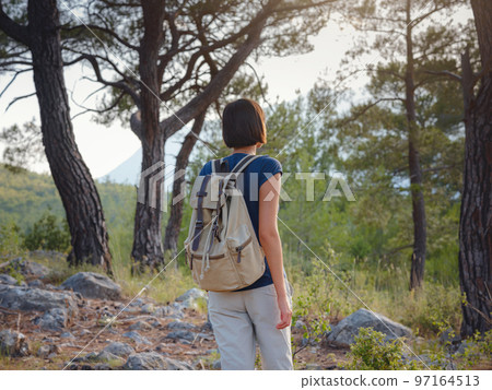 woman traveler walking by Lycian Way trail woman traveler walking by Lycian Way trail 97164513