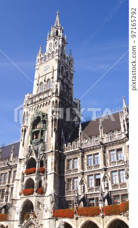 MUNICH, GERMANY - 12 OCT, 2015: Munich City Hall at Marienplatz in the city centre of the Bavarian capital MUNICH, GERMANY - 12 OCT, 2015: Munich City Hall at Marienplatz in the city centre of the Bavarian capital 97165792