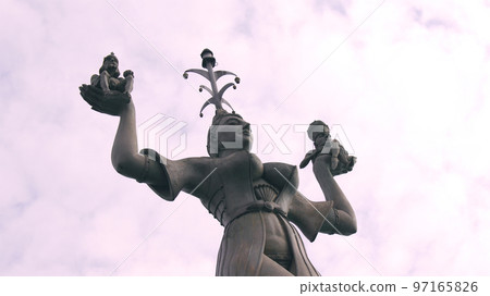 KONSTANZ, GERMANY - OCT 14, 2015: Imperia is a statue in the harbour of Konstanz on Lake Constance. The figure, which was erected in 1993, is cast in concrete, nine metres high, weighs 18 tonnes and KONSTANZ, GERMANY - OCT 14, 2015: Imperia is a statue in the harbour of Konstanz on Lake Constance. The figure, which was erected in 1993, is cast in concrete, nine metres high, weighs 18 tonnes and 97165826