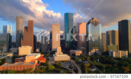 Skyline of Houston Texas at sunset - HOUSTON, UNITED STATES - OCTOBER 30, 2022 97167109