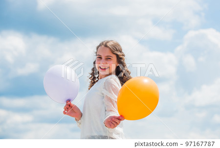 Multi colored fun. summer holidays and vacation. childhood happiness. feeling free and carefree. little kid in spring holiday. child have fun. happy birthday party. small girl with party balloon Multi colored fun. summer holidays and vacation. childhood happiness. feeling free and carefree. little kid in spring holiday. child have fun. happy birthday party. small girl with party balloon 97167787