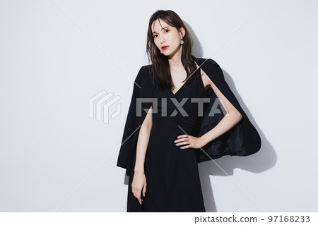 Woman in black dress 97168233