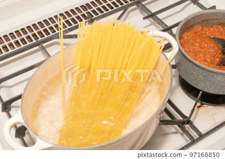 Cut to boil pasta Cut to boil pasta 97168850