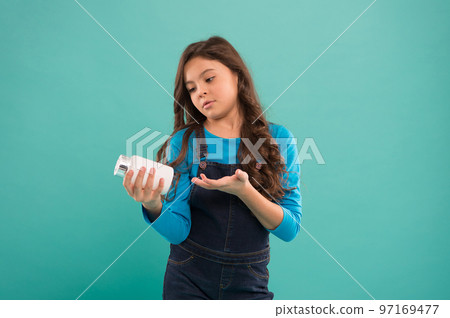 Boost immunity. Omega oils and acids. Best vitamins. Safe container. Little cute child going to take vitamin. Food additives. Pills for kids. Vitamin and mineral complex. Medicine concept Boost immunity. Omega oils and acids. Best vitamins. Safe container. Little cute child going to take vitamin. Food additives. Pills for kids. Vitamin and mineral complex. Medicine concept 97169477